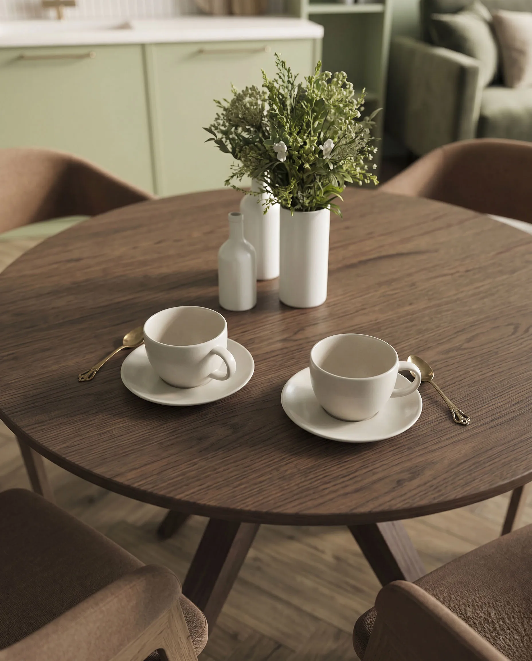 Two cups on a table in warm light